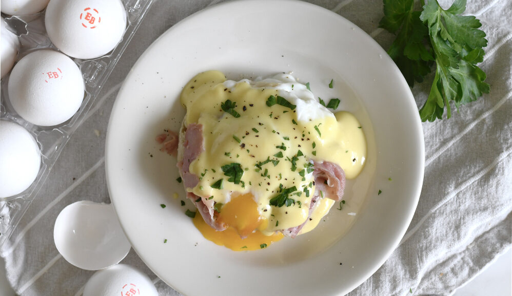 Photo of Irish Egg Benedicts with White Cheddar Cheese Hollandaise Sauce