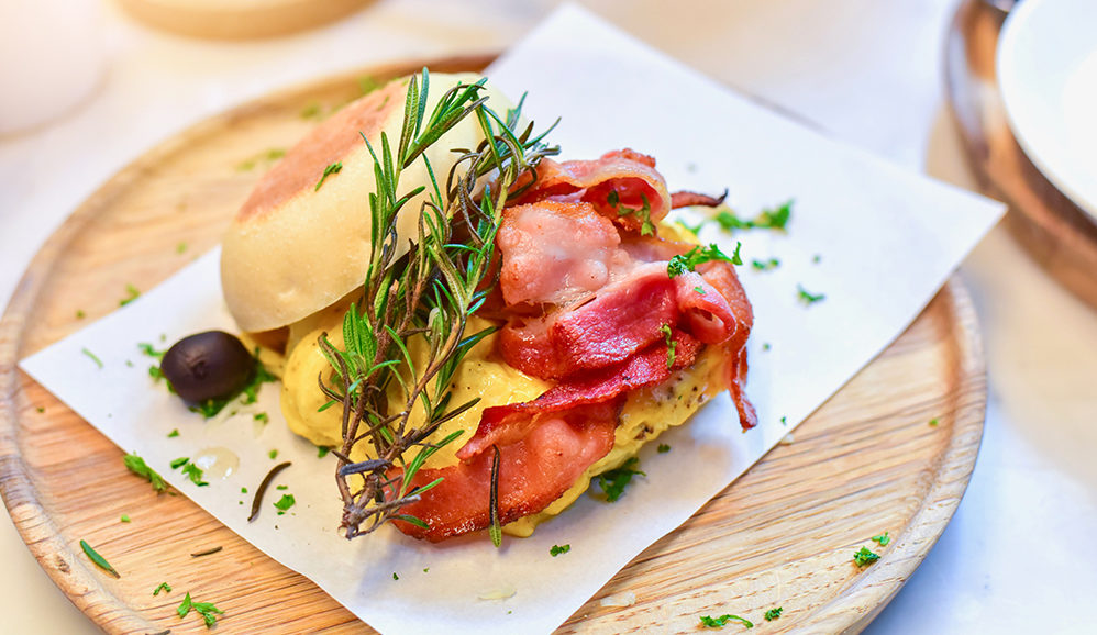 Maple Almond Butter Toast with Sautéed Apples, Rosemary Scrambled Eggs and Bacon