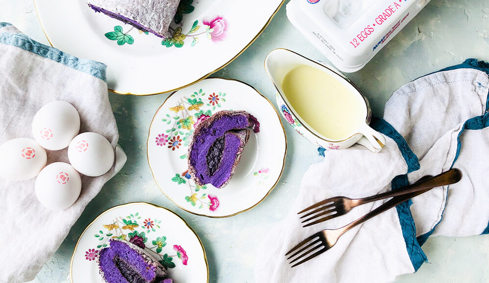 Photo of Ube Brazo De Mercedes With Coconut Cream Sauce