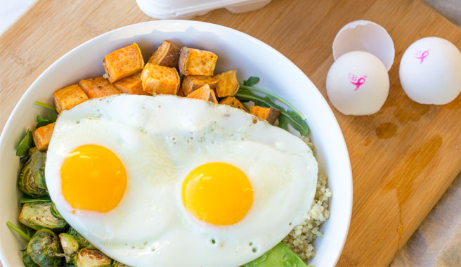 Roasted vegetables topped with two EB eggs